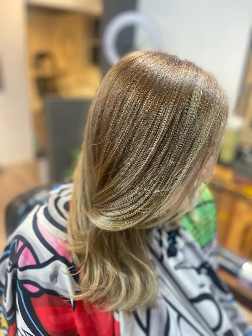 A blonde lob with soft movement through the ends.